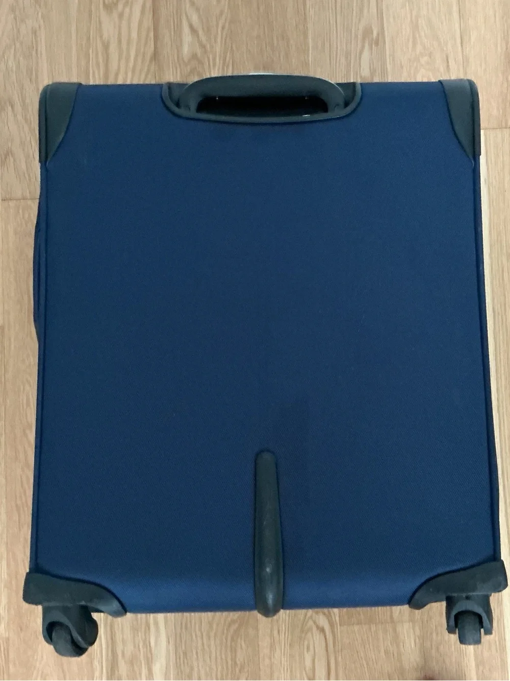 Samsonite Optimum softside spinner carry-on suitcase.